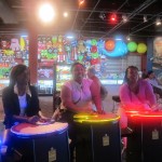 residents playing arcade games