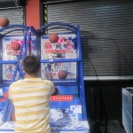 resident playing arcade game